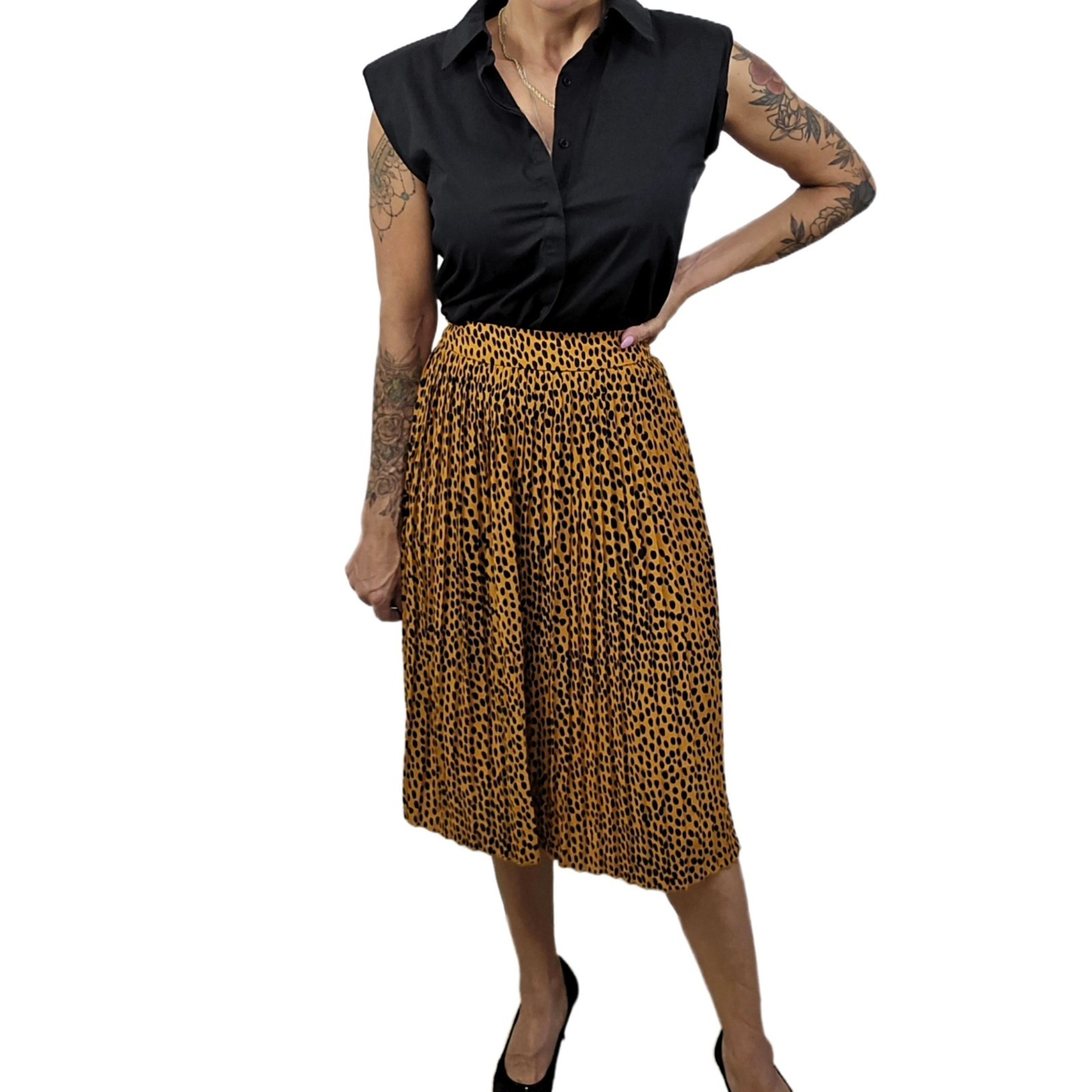J.Crew pleated midi skirt in leopard print, labeled Women’s Size 4P.