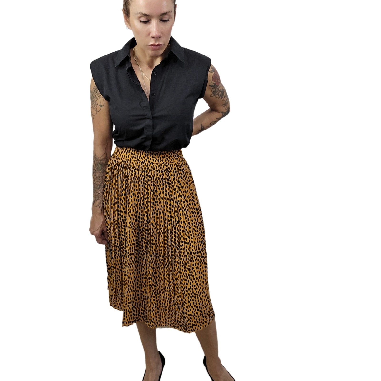 J.Crew pleated midi skirt in leopard print, labeled Women’s Size 4P.
