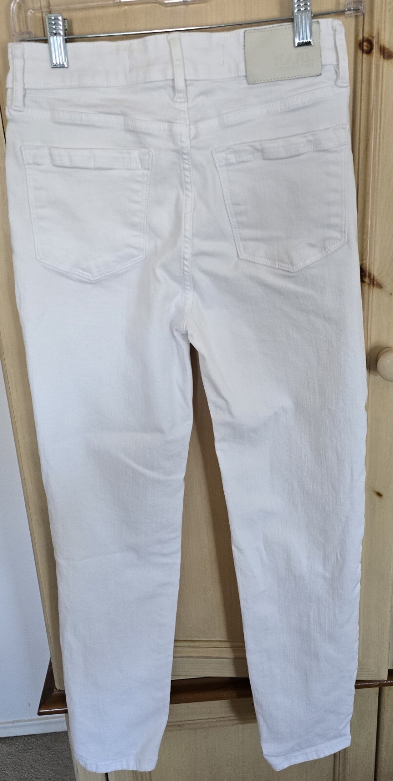 Karl Lagerfeld High-Rise Straight Leg Jeans – Luxe White Denim with Logo Patch.