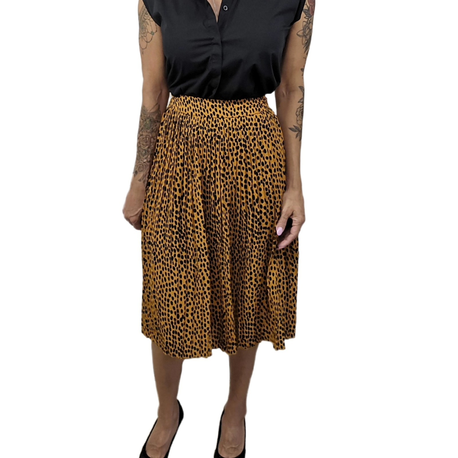 J.Crew pleated midi skirt in leopard print, labeled Women’s Size 4P.