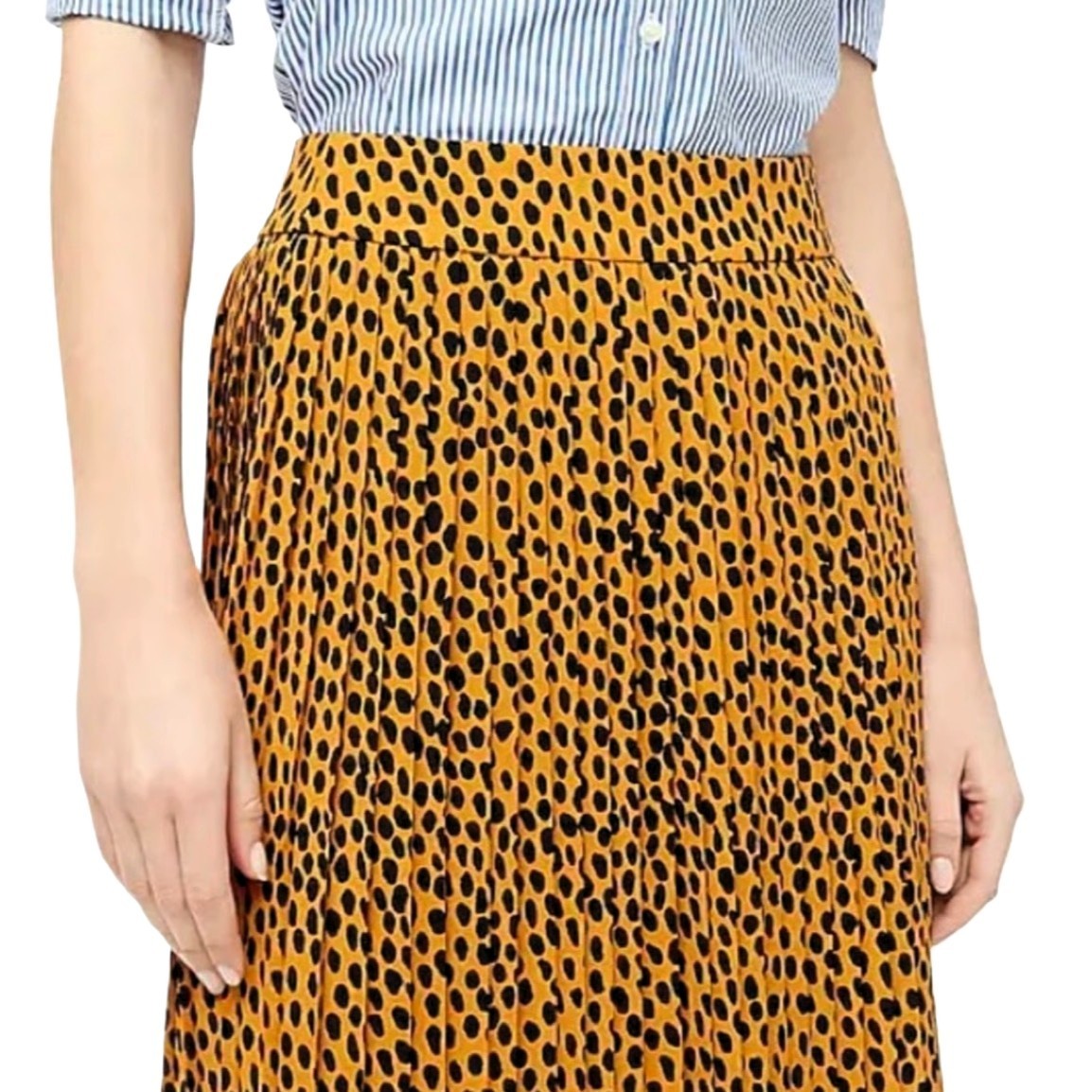 J.Crew pleated midi skirt in leopard print, labeled Women’s Size 4P.