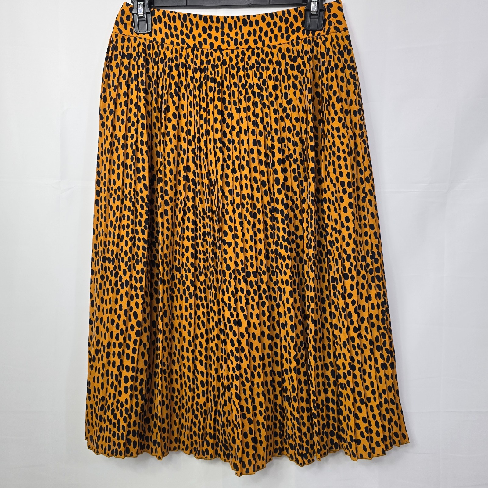 J.Crew pleated midi skirt in leopard print, labeled Women’s Size 4P.